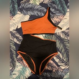 Victoria’s Secret one-piece swimsuit. New with tags. Size XL